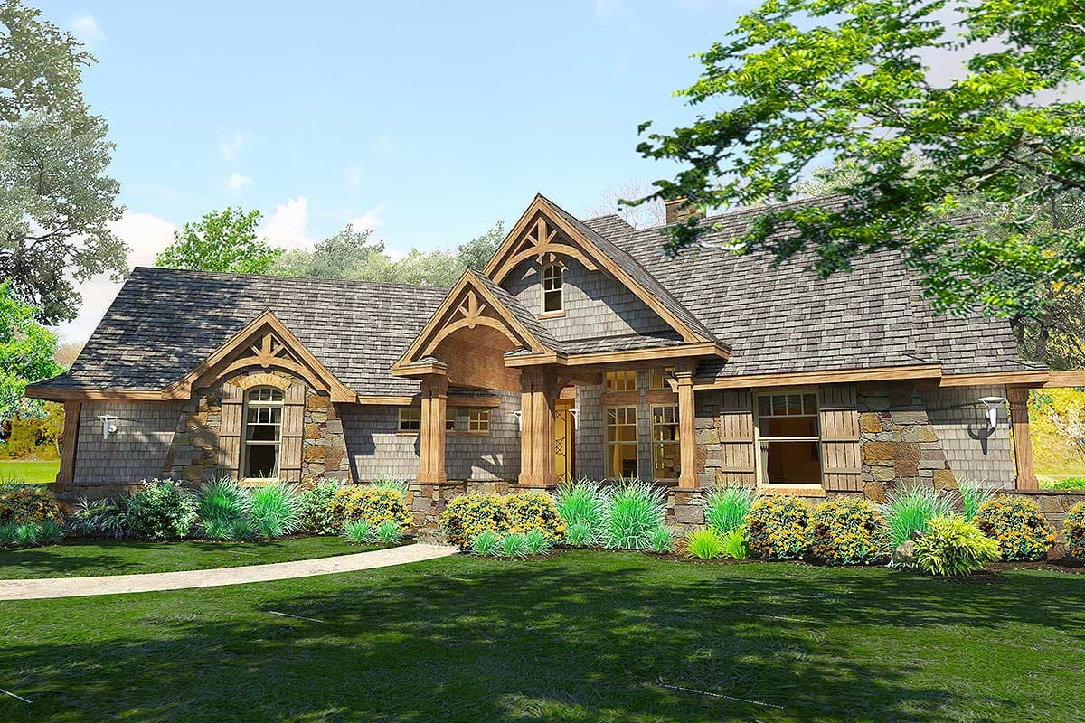 House plan exterior: Timber-frame entrance porch, stone and shake siding, decorative gables, and arched window.