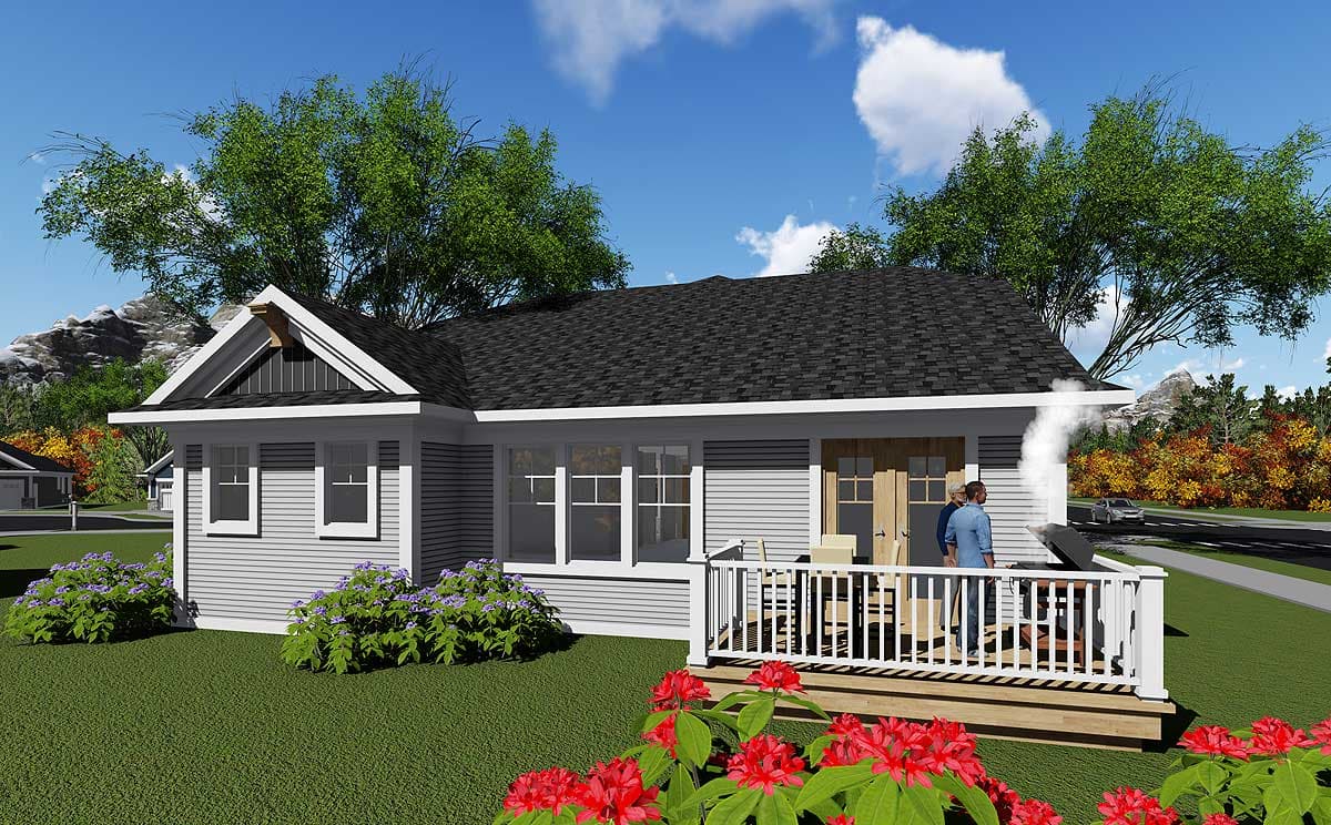House plan exterior: One-story home with gabled front, clapboard siding, and a front deck with white railings.