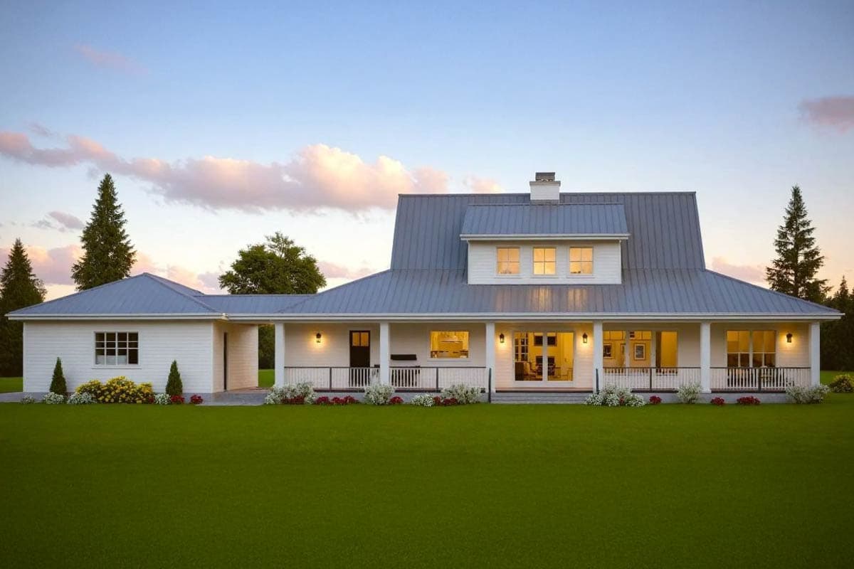 Modern Farmhouse house plan exterior with a wraparound porch, metal roof, and attached garage.
