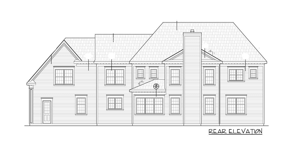 Rear elevation drawing of a house plan with multiple gables, a prominent chimney, and numerous windows.