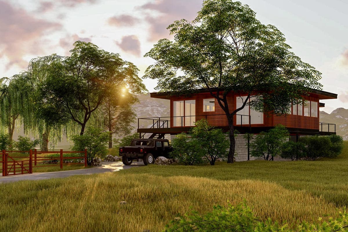 Modern house plan exterior with wood siding, extensive glass, wrap-around deck, and elevated foundation.