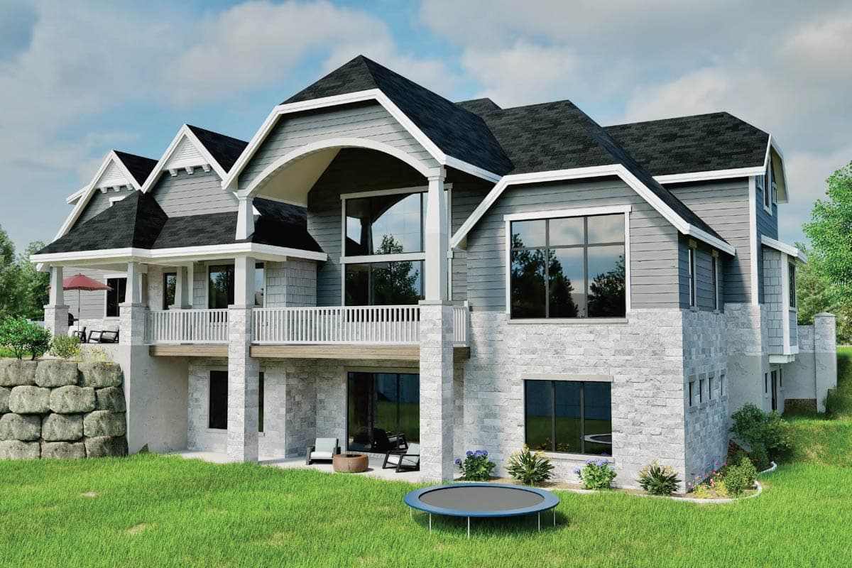House plan exterior, modern style with multiple gables, stone and shingle siding, covered deck, and large windows.