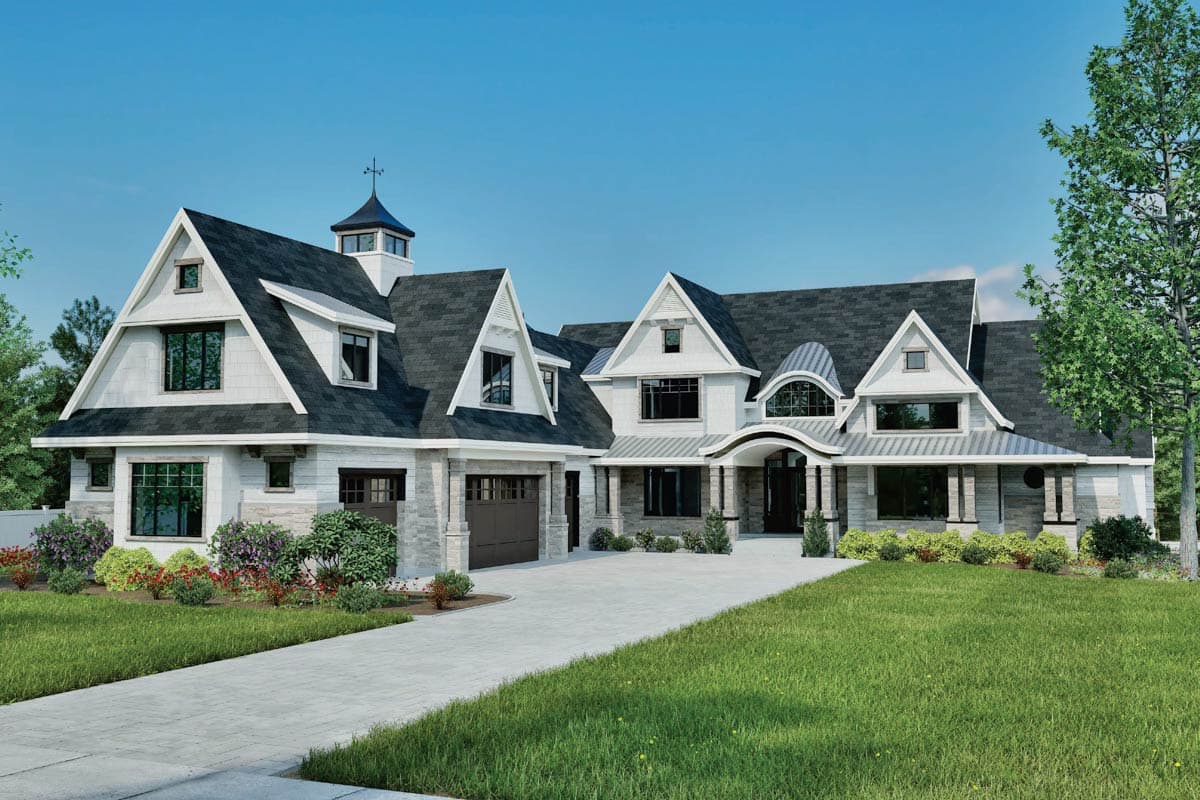 House plan exterior with multiple gables, a cupola, and a two-car garage. Features include a covered porch and stone accents.