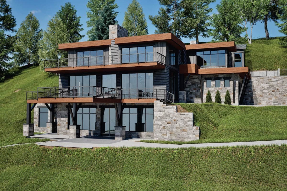 Modern house plan exterior featuring stone and wood siding, multiple balconies, and large windows on a sloped lot.