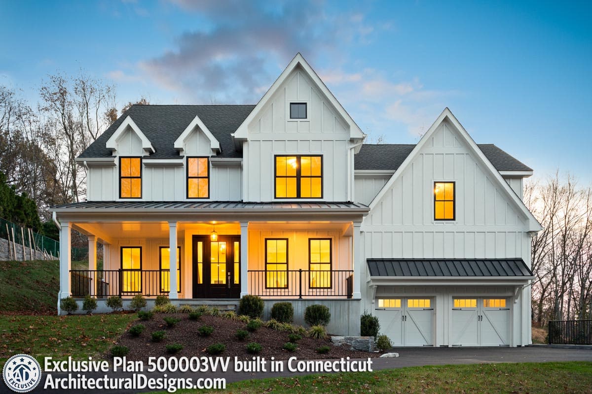 Modern Farmhouse house plan exterior, two stories, wide front porch, gables, and attached two-car garage.