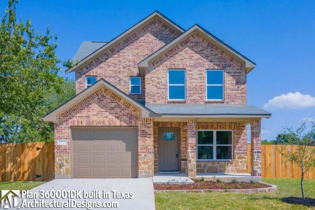 Two-story brick house plan exterior with gabled rooflines, covered front porch, and attached garage.