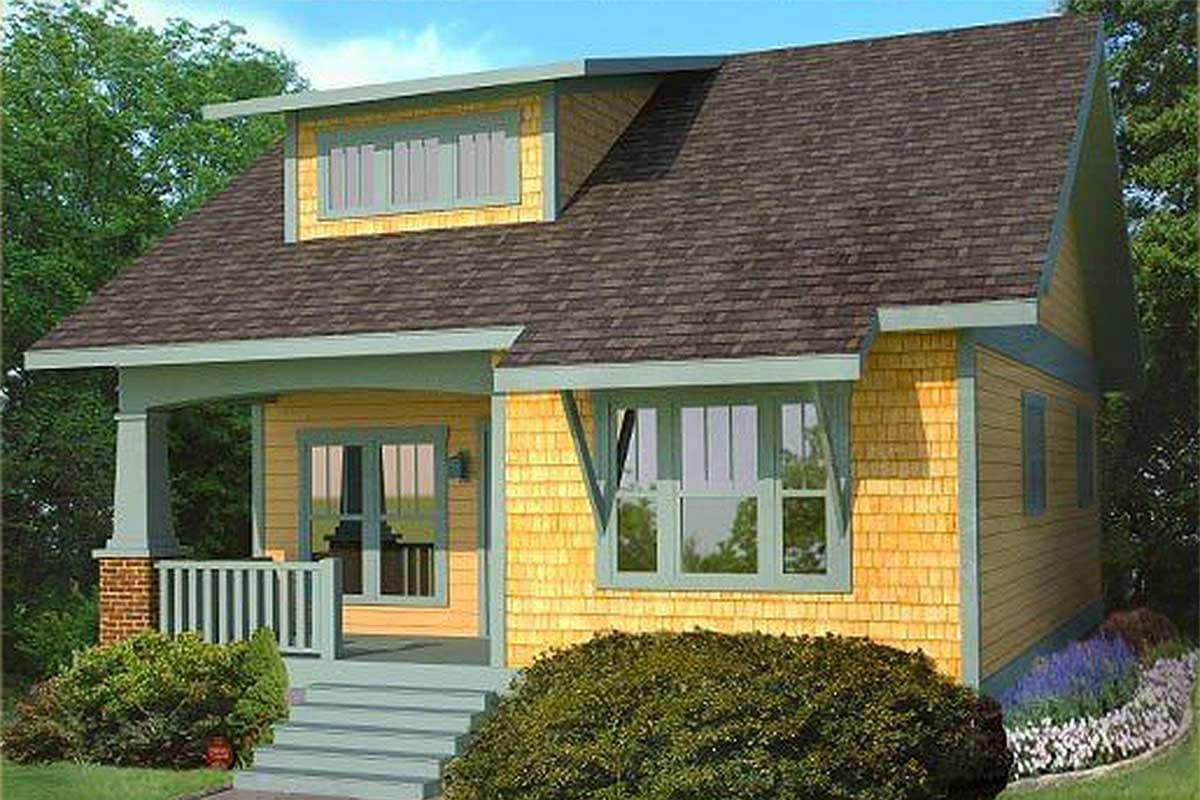 House plan exterior: Two-story cottage with a front porch, shingle siding, and a prominent dormer.