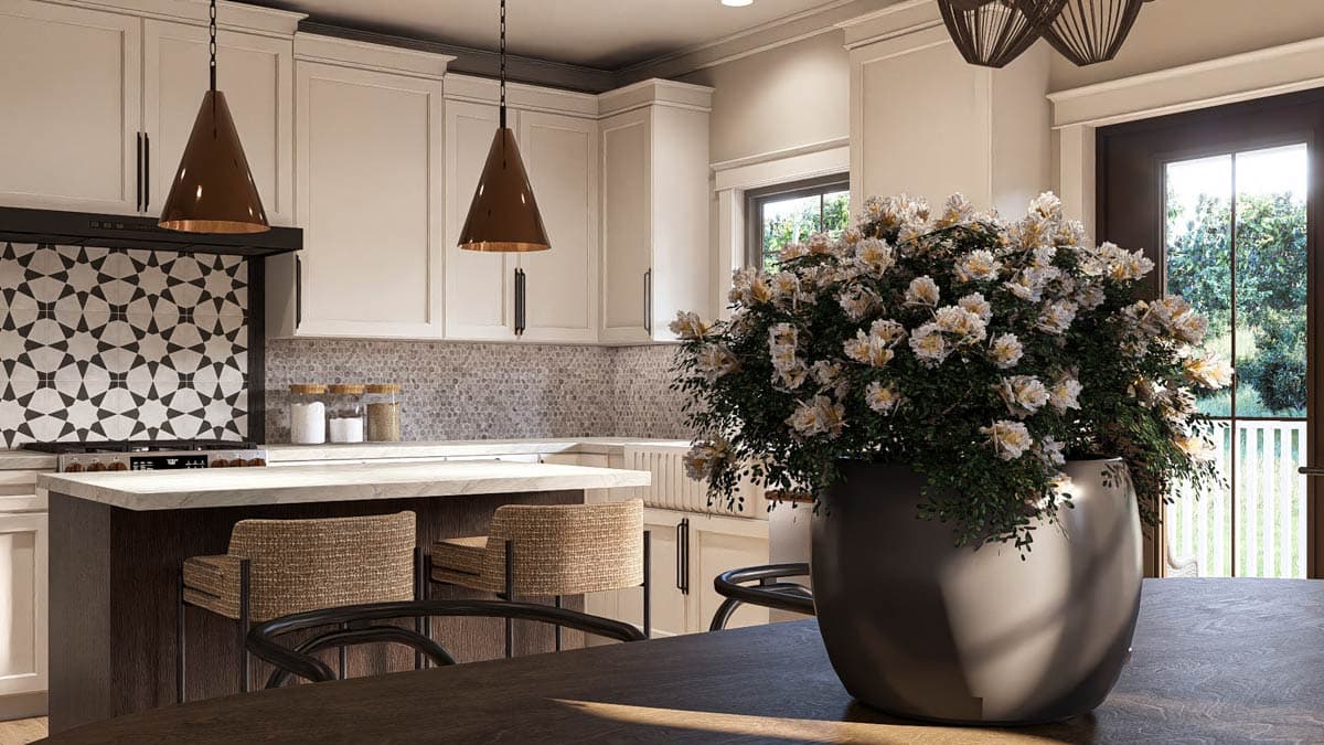 Kitchen with island, pendant lights, patterned tile backsplash, and a large floral arrangement.