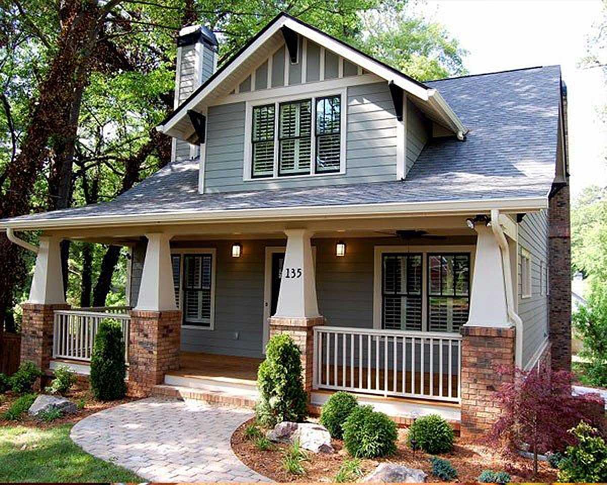 Craftsman style house plan exterior with covered porch, brick base, gables, and a prominent chimney.