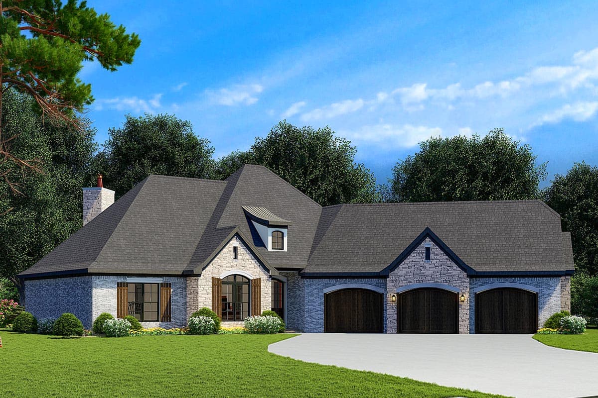 House plan exterior featuring a multi-gabled roof, stone accents, arched windows, and a three-car garage.