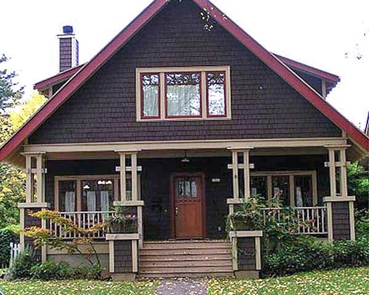 Craftsman style house plan exterior with a large covered front porch, prominent gables, and shingle siding.