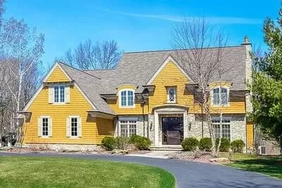 Four-Bed French Country Home Plan with Hearth Room - 3790 Sq Ft