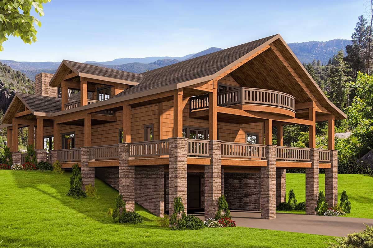 House plan exterior, two-story rustic home with a balcony, stone-clad supports, and a gabled roof.