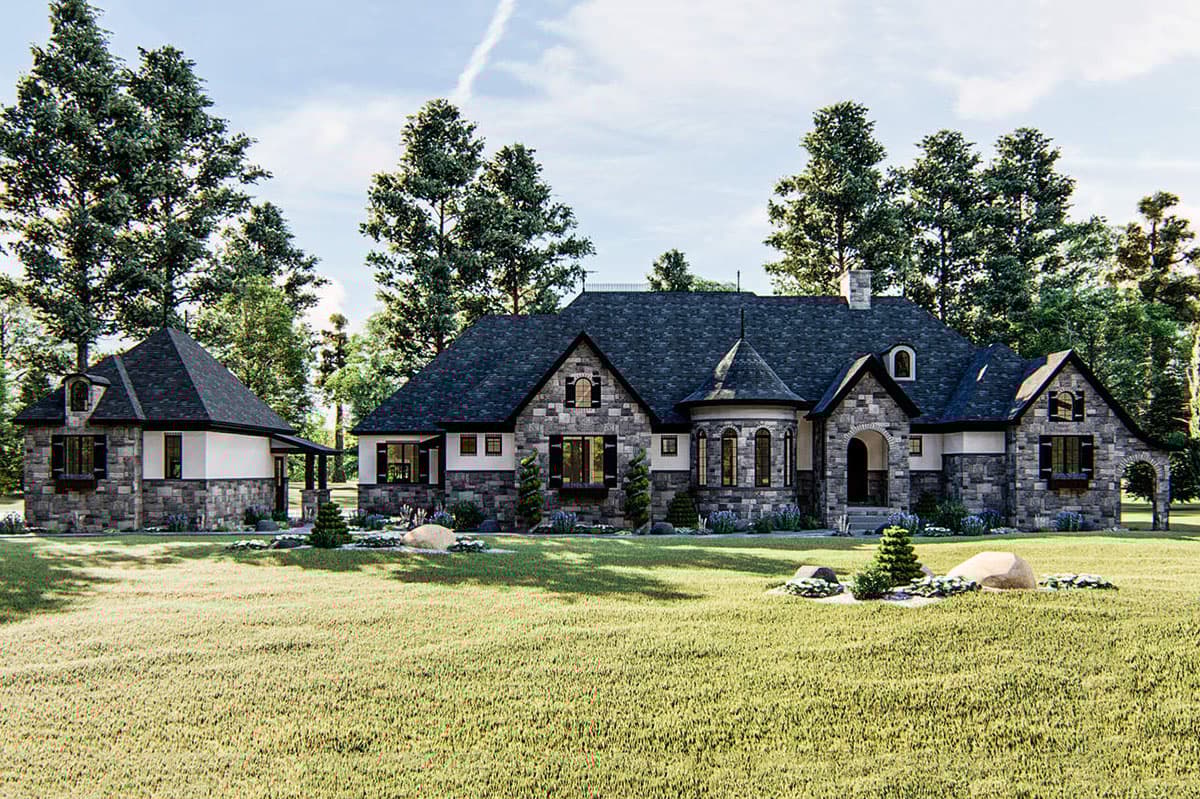 House plan exterior. Two-story Tudor style home with stone facade, turret, and multiple gables. Features attached garage and arched entry.