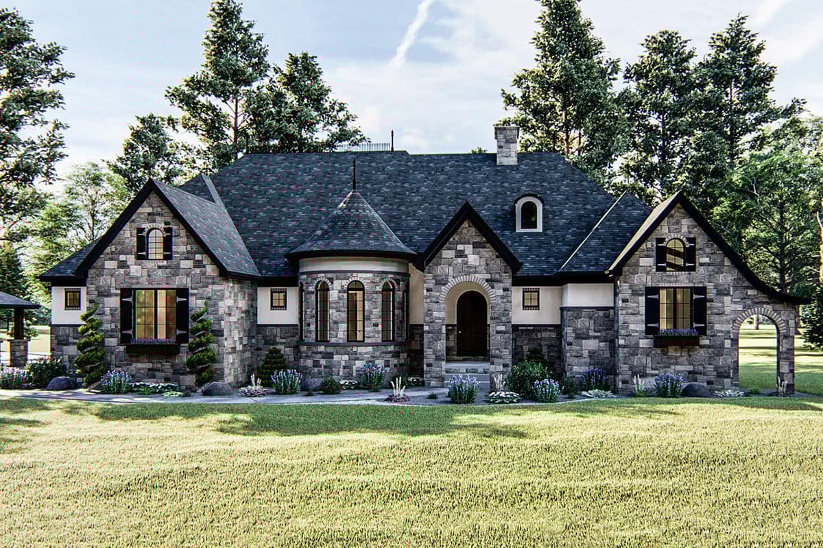 House plan exterior: two-story stone home with dark roof, arched entryway, turret, multiple gables, and dormer windows.