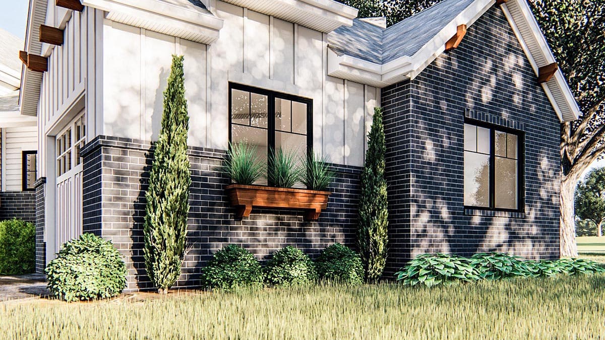 Modern Farmhouse house plan exterior with dark brick, white board-and-batten siding, exposed rafters, and window boxes.