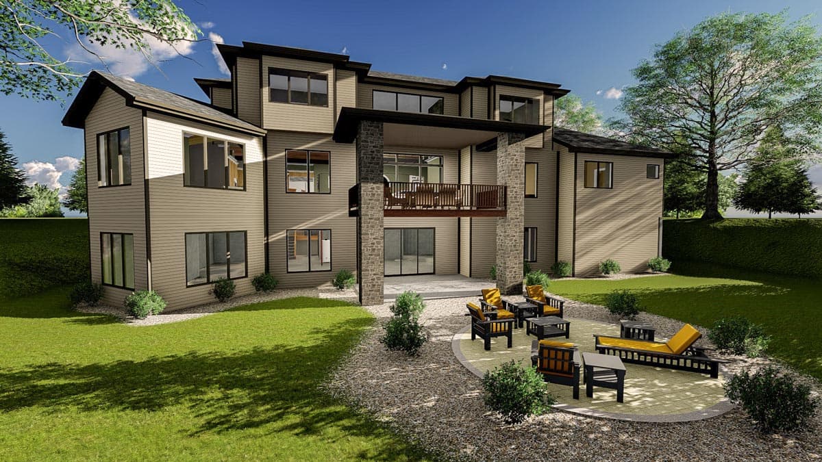 House plan exterior: Modern multi-story home with stone-accented pillars supporting a second-story balcony, multiple gables, and large windows.