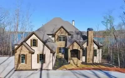 Luxury House Plan with 3 Fireplaces and 2-Story Living Room