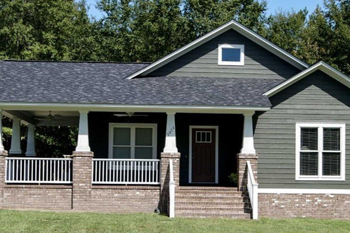 House plan exterior: One-story Modern Farmhouse with a covered porch, brick foundation, gables, and a dormer window.