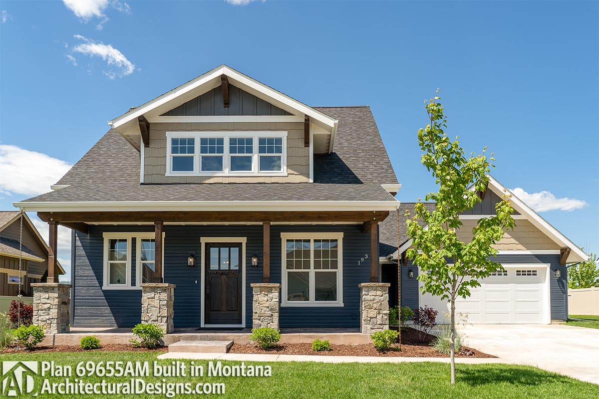 Craftsman style house plan exterior with covered porch, stone column bases, dormers, and two-car garage.