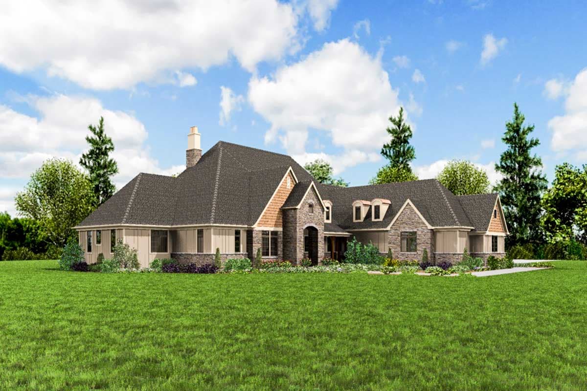 House plan exterior: Large L-shaped single-story home with stone accents, multiple gables, dormers, and prominent chimney.