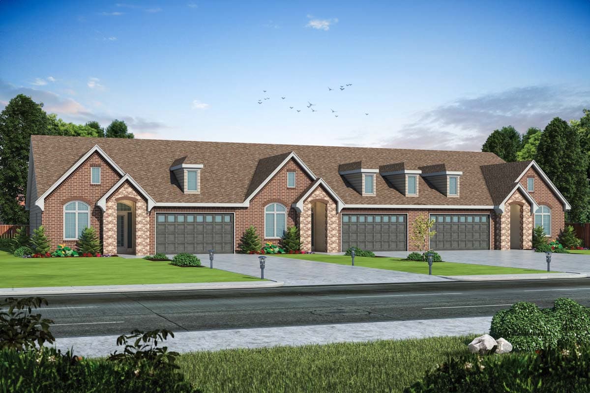 House plan exterior. Two-story brick facade. Features include gable roof, arched entryway, dormers, and attached garages.