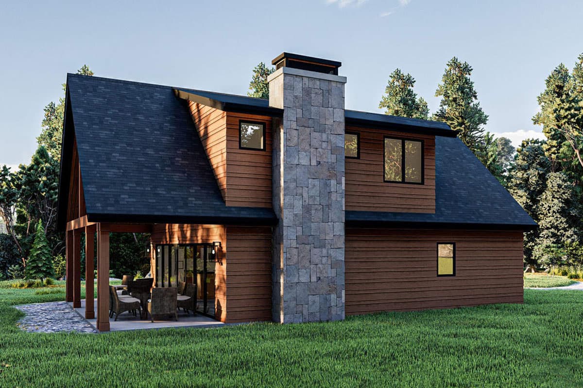 House plan exterior showcasing a wood-sided house with a stone chimney, covered porch with seating, and gabled rooflines.