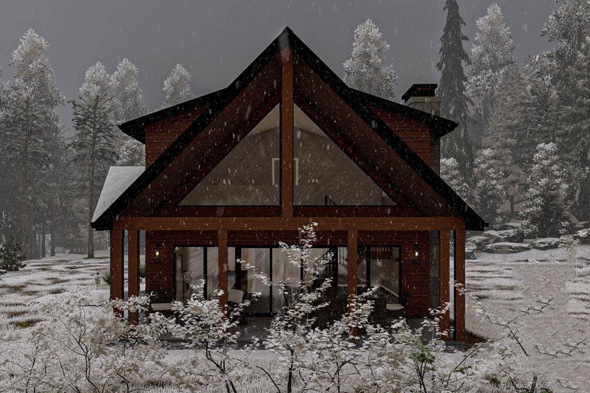 Modern cabin house plan exterior with a large A-frame gable, exposed timber beams, and a covered porch with sliding glass doors.