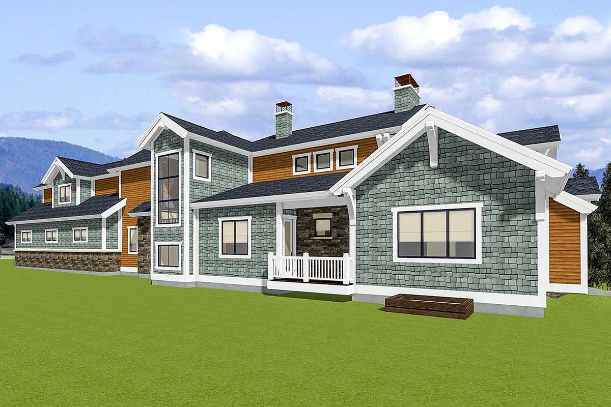 House plan exterior with shake siding, stone accents, multiple gables, dormers, and a covered porch.