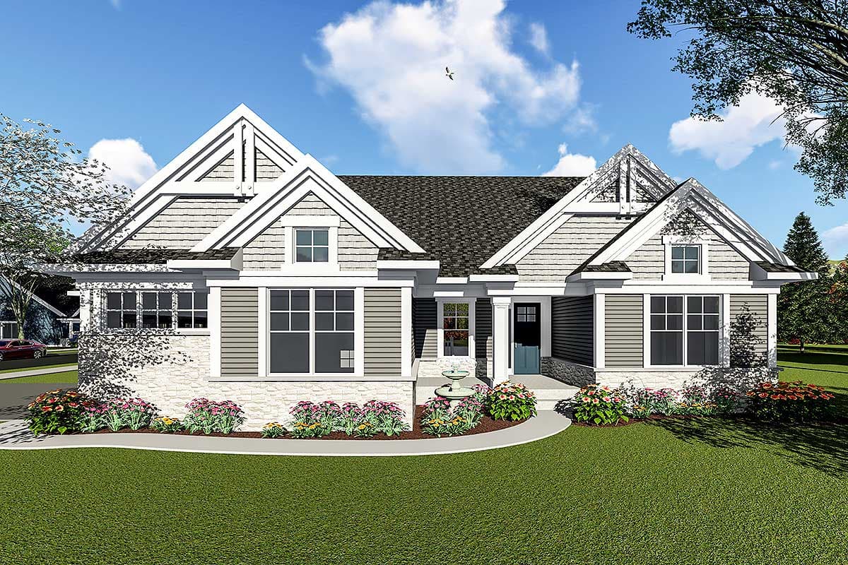 House plan exterior. Craftsman style, single-story home with gables and dormers. Features include a covered porch and shingle siding.