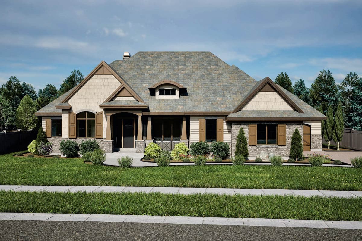 House plan exterior with stone veneer and shingle siding. Features include a front porch, gables, and a dormer. One story, with a slate roof.