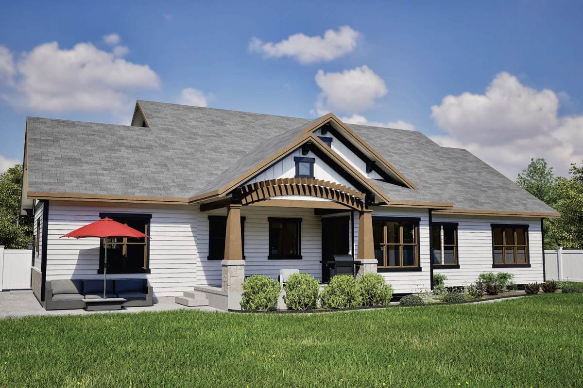 House plan exterior, single-story, white siding, gabled roof, covered porch with stone pillars and pergola detail.