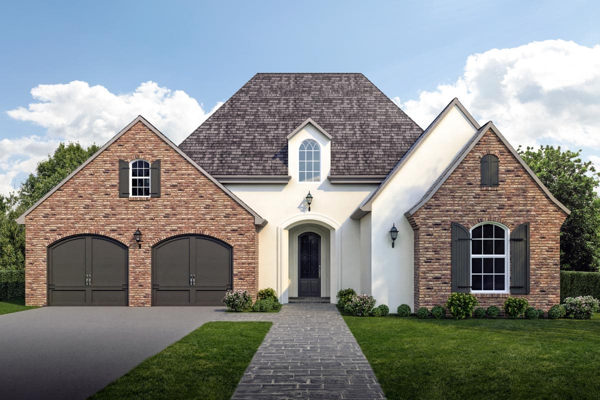 House plan exterior with two-story design. Features include brick and stucco facade, arched garage doors, and a central gabled roofline.
