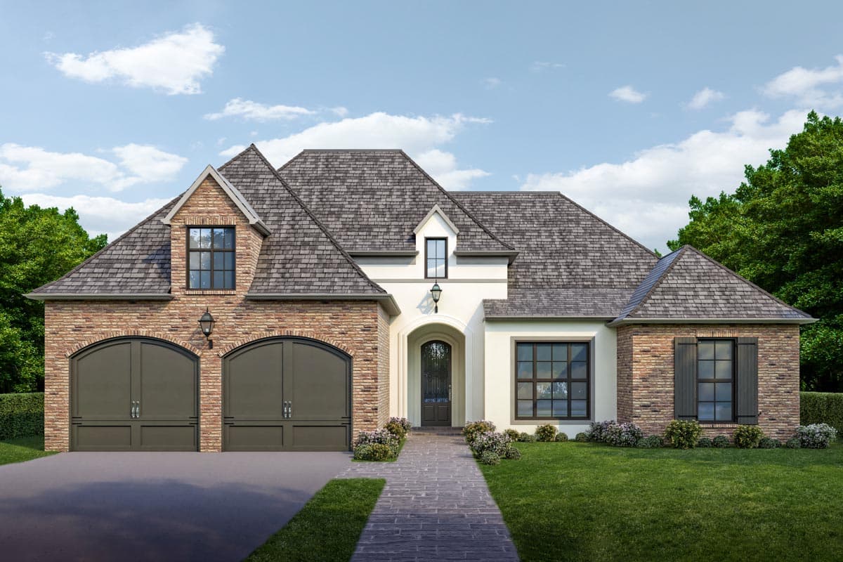 House plan exterior. Two-story with brick and stucco facade, gabled roof, arched garage, and dormer windows.