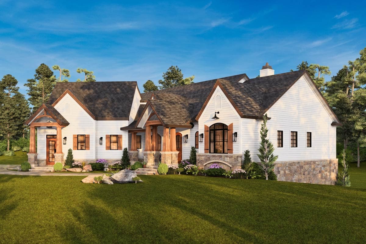 House plan exterior: Modern Farmhouse style, white siding, stone foundation, multiple gables, and covered entryways with wooden posts.