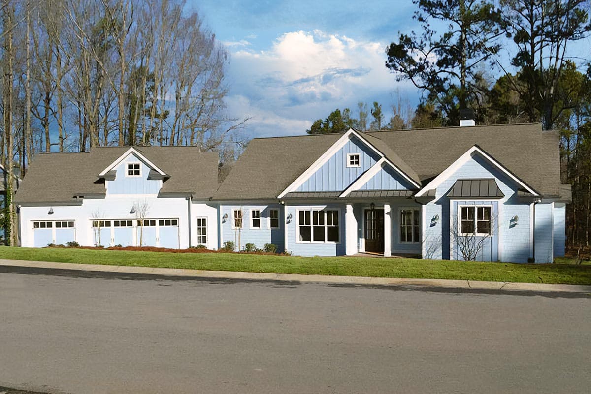 House plan exterior. One-story Craftsman with multiple gables, front porch, and dormers. Features a detached garage and light blue siding.