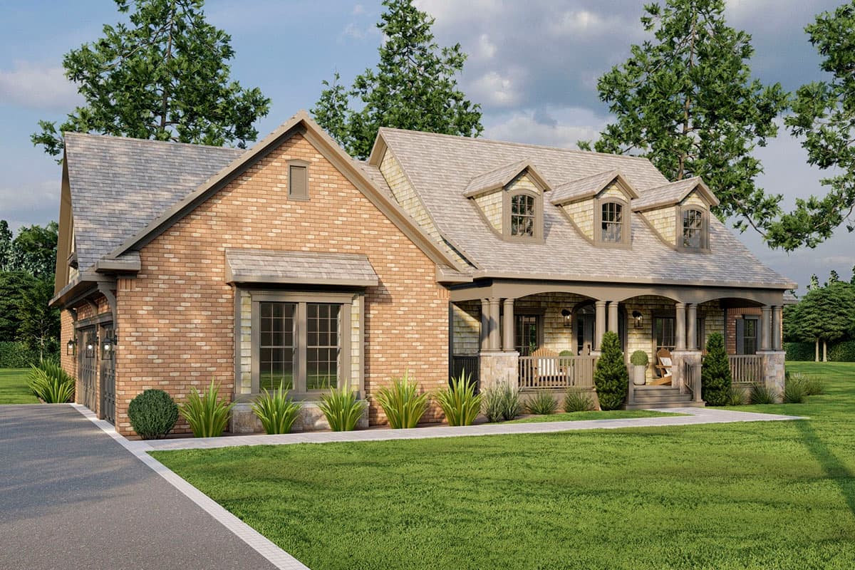 House plan exterior: Brick one-and-a-half-story home with a covered front porch, dormer windows, and a side-entry garage.