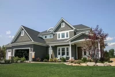 Exclusive Shingle Style House Plan with Vaulted Bedrooms