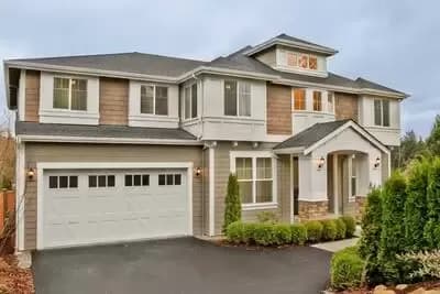 Three Level Traditional House Plan with 4 Car Tandem Garage