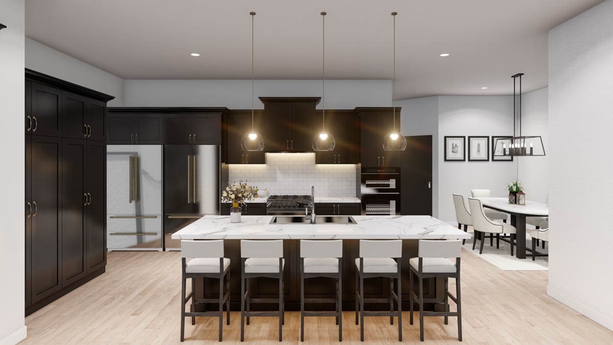 Modern kitchen with dark cabinetry, large island with seating, stainless steel appliances, and pendant lighting.