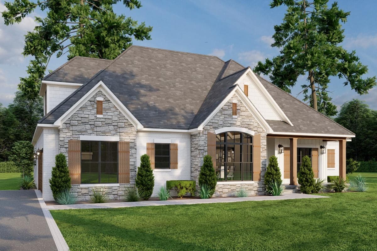 House plan exterior with stone accents, white brick, gables with dormers, and a covered porch with wood columns.