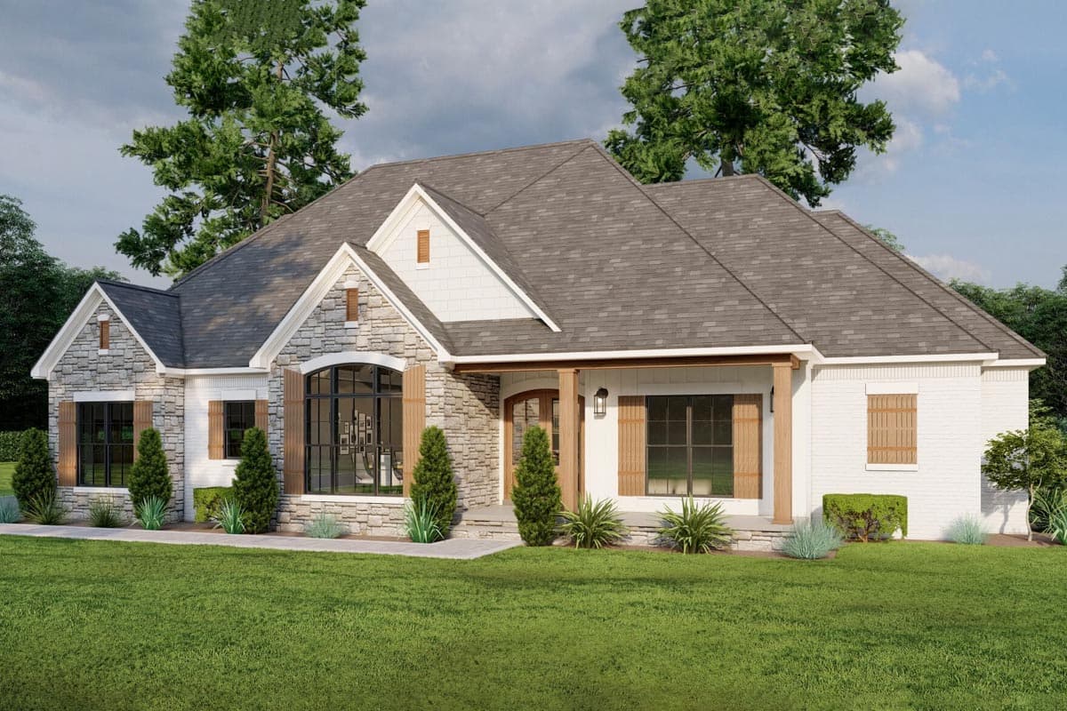 House plan exterior: One-story home with stone and white brick, covered porch, gables, and wooden shutters.