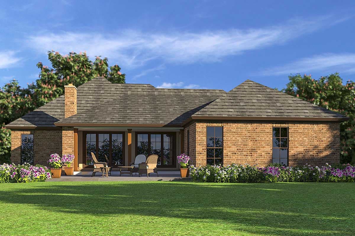 House plan exterior: Ranch style with brick facade, prominent gable, covered patio with French doors and a chimney.