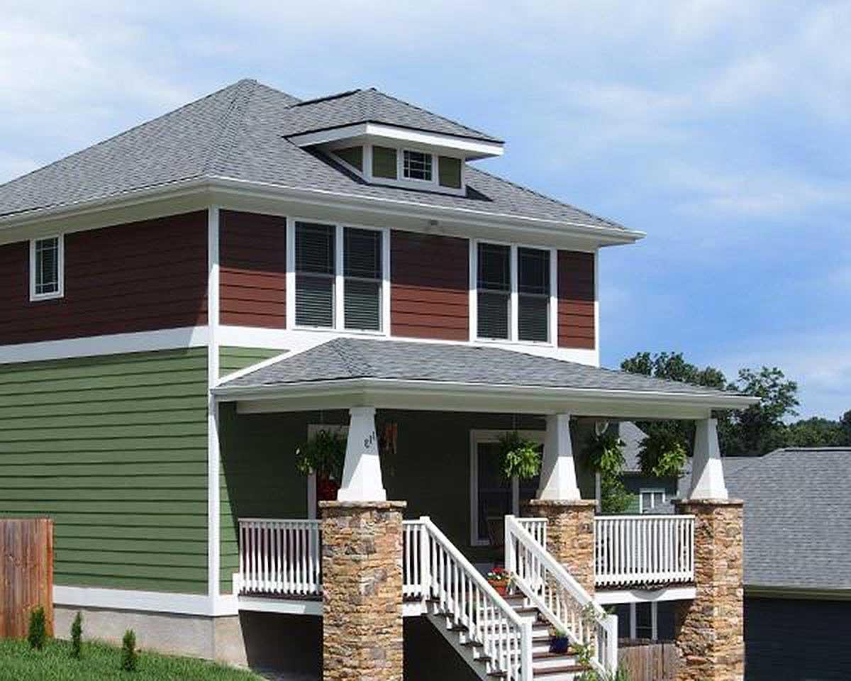Two-story house plan exterior with a hipped roof, dormer, stone-clad porch columns, and a wrap-around porch.