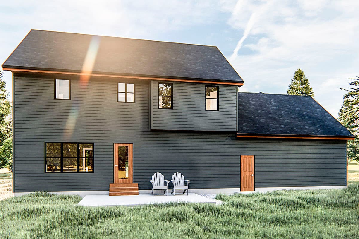 House plan exterior: two-story modern home with dark siding, prominent gables, and a rear patio with two chairs.