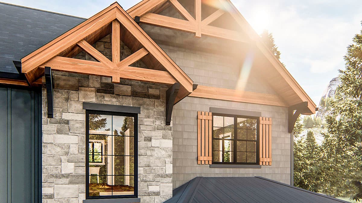 House plan exterior featuring stone and shingle siding, exposed rafter tails, and gable rooflines.