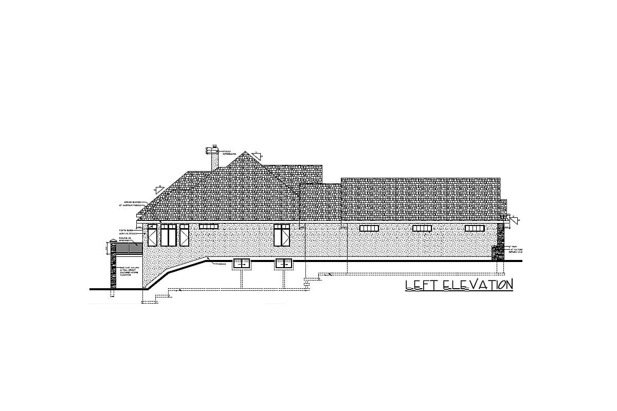 House plan left elevation showing multiple rooflines, chimney, windows, and sloped foundation.