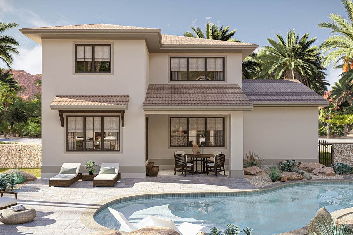 Two-story house plan exterior with a hipped roof, casement windows, and covered patio with outdoor dining.