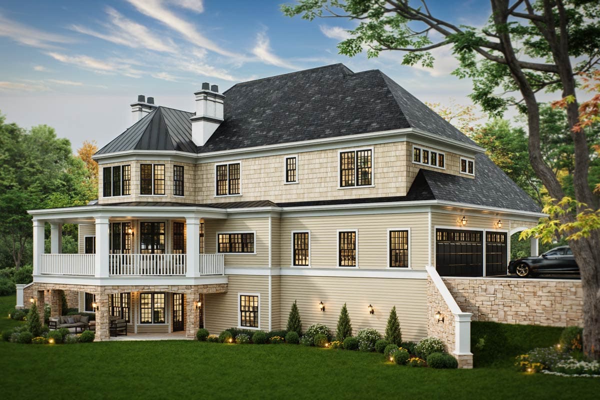 House plan exterior, a multi-story home with a wraparound porch, shingle siding, and a three-car garage.