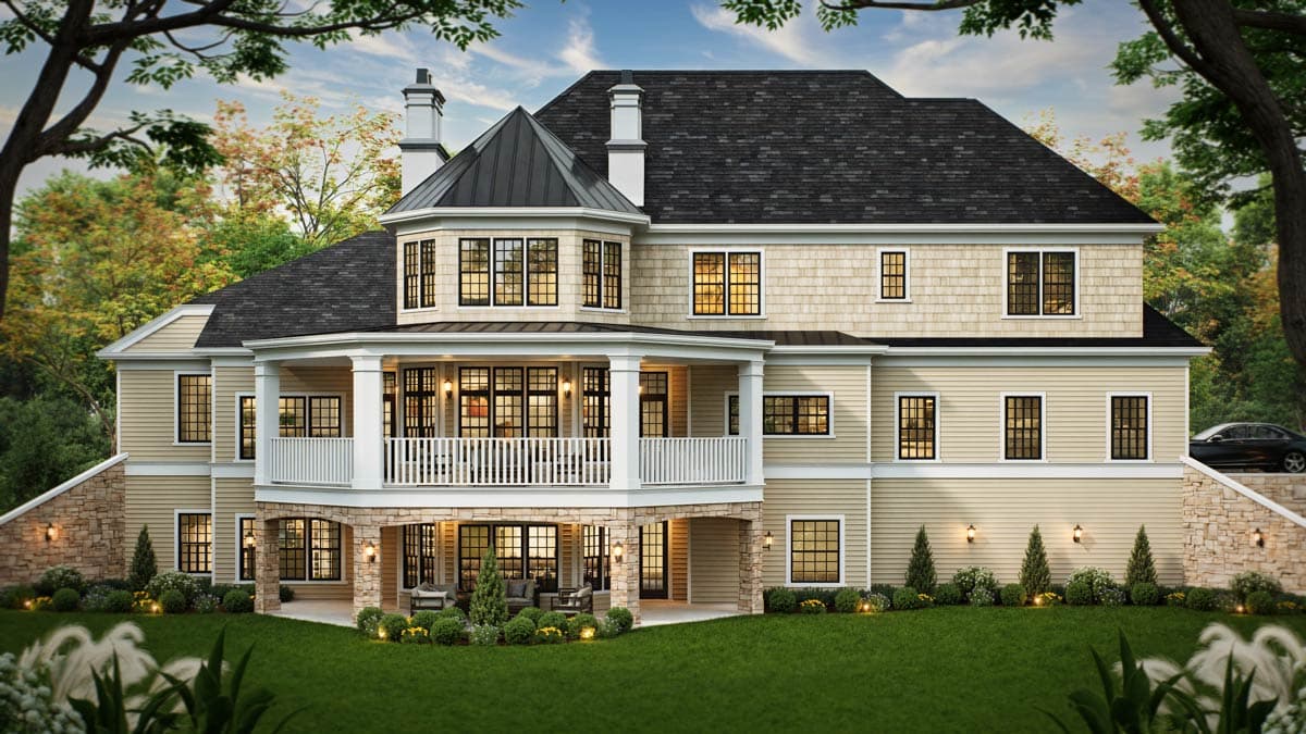 House plan exterior of a multi-story home with a prominent wraparound porch, stone accents, and a turret.